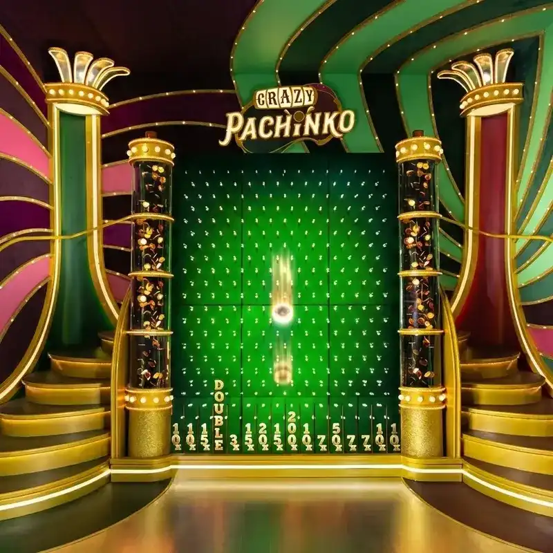 Pachinko — peg wall with puck dropping toward multiplier slots